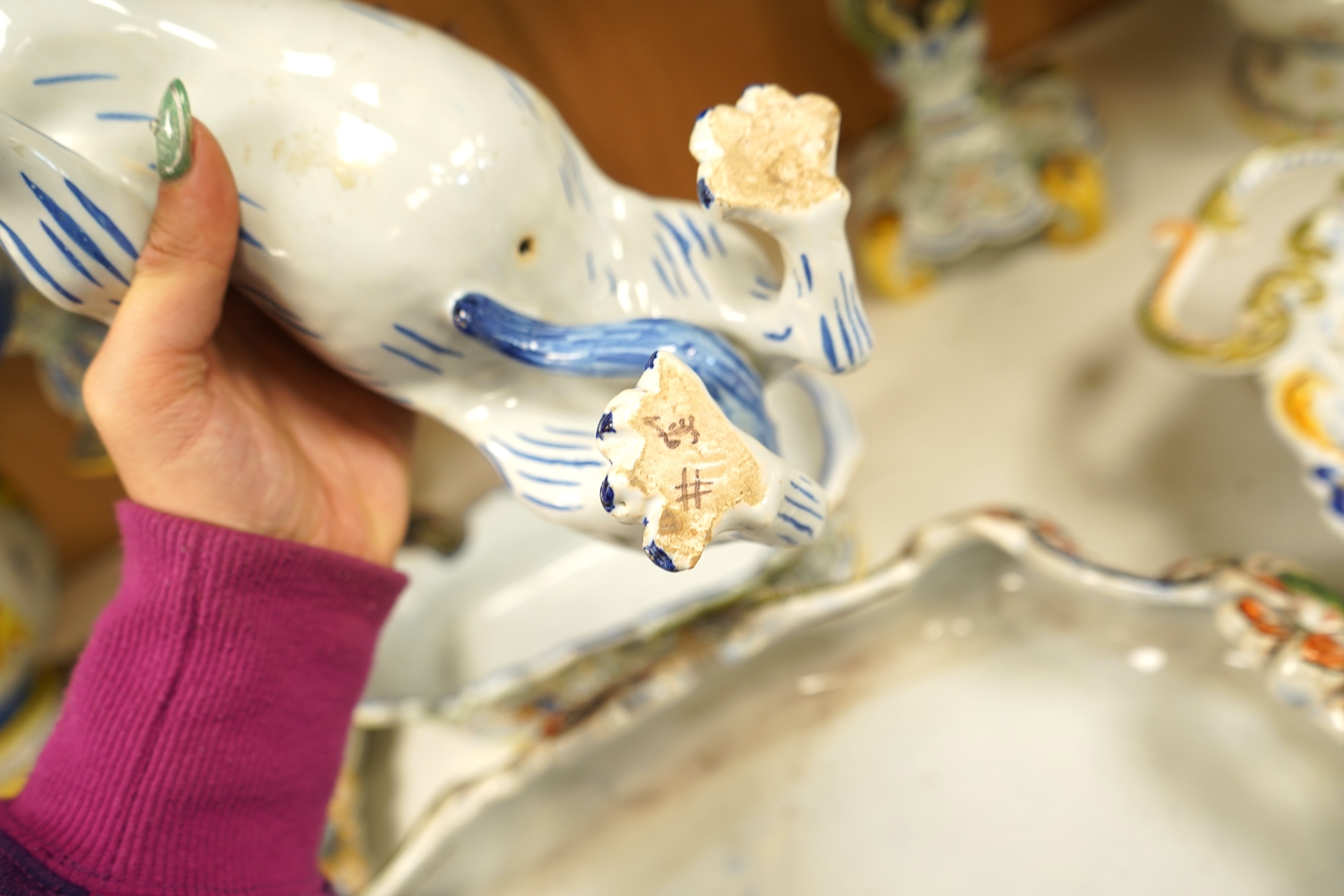 A collection of early 20th century French faience pieces To include dishes, an inkwell and a large ewer, 42cm high